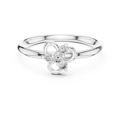 Dainty minimalist floral clover leaf ring featuring a halo cluster of sparkling diamonds