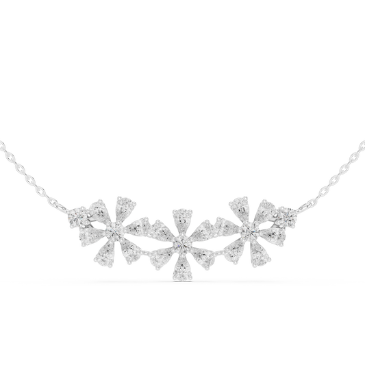 Diamond floral motif necklace featuring a delicate flower design on a polished chain