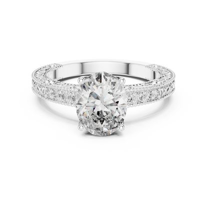 Oval-cut diamond engagement ring with pavé side stones in white gold

Elegant women’s engagement ring featuring oval center and pavé accents

Statement bridal ring with sparkling side stones
