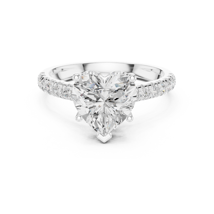 Heart-shaped simulated diamond halo engagement ring in white gold

Romantic women’s engagement ring with heart center and pavé halo

Elegant bridal ring featuring heart-shaped center stone and accent diamonds