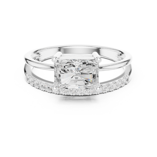 Radiant-cut diamond engagement ring with pavé-set side stones in white gold

Modern solitaire engagement ring featuring radiant-cut diamond and pavé accents

Women’s diamond ring with radiant center and pavé side stones