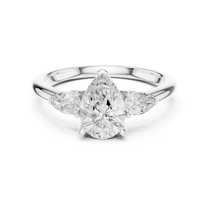 Pear-shaped three-stone engagement ring with lab-grown center diamond in 935 silver

White gold engagement ring featuring pear-cut center and two side diamonds

Elegant women’s three-stone engagement ring with lab-grown diamonds