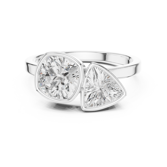 Cushion-cut and trillion-cut diamond two-stone bypass ring in 935 silver

Elegant two-stone engagement ring with cushion and trillion diamonds in white gold

Modern bypass ring featuring cushion-cut and trillion-cut lab-grown diamonds