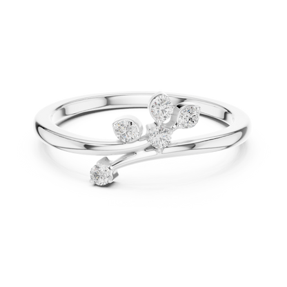 Silver ring with diamond accents on a white background