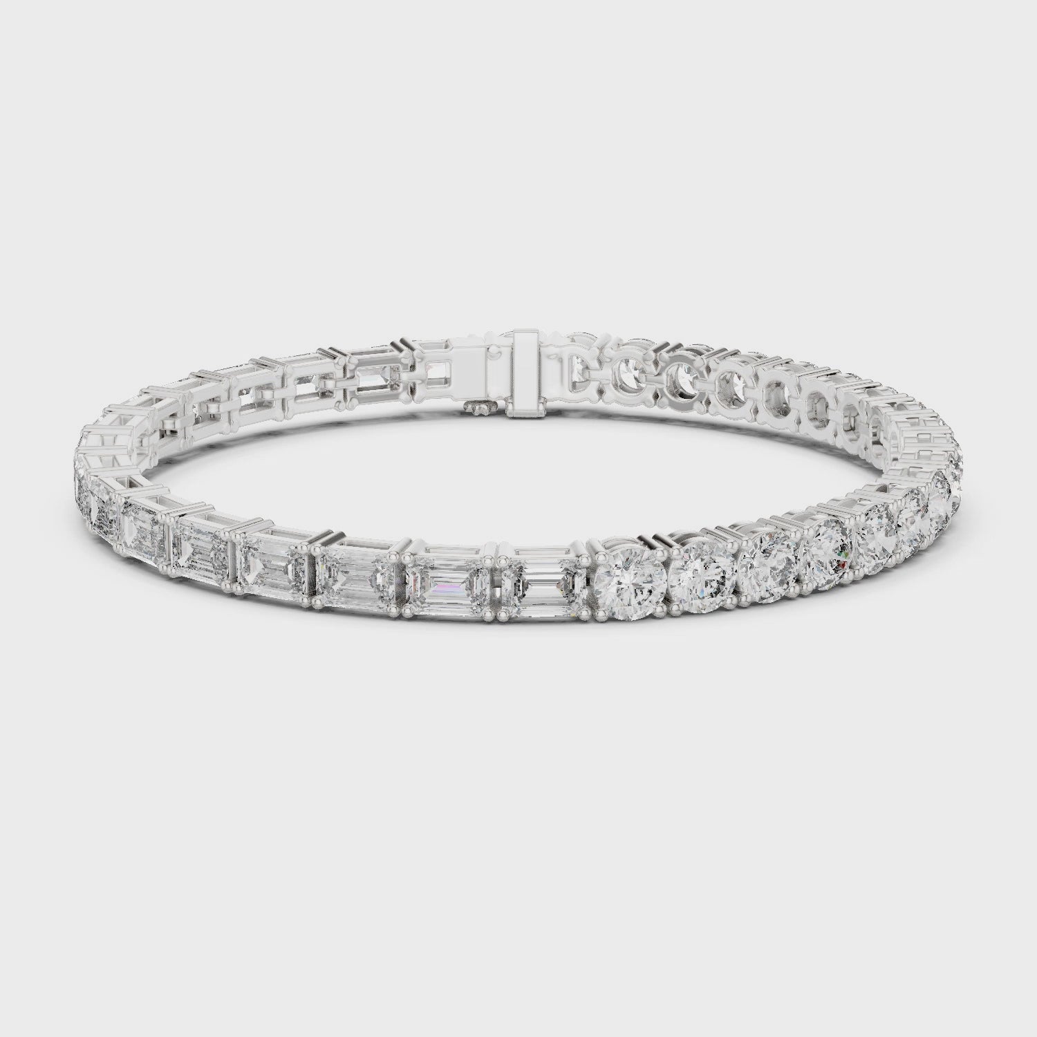 Alternating emerald-cut and round diamond tennis bracelet with polished metal setting