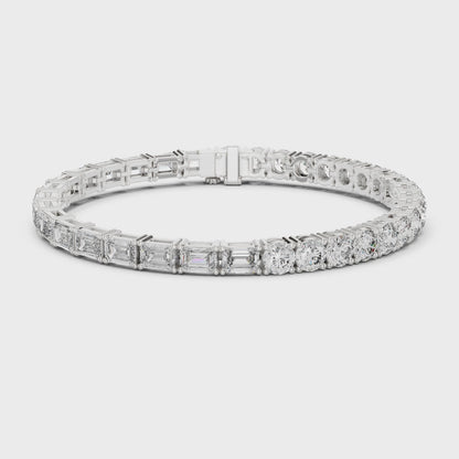 Alternating emerald-cut and round diamond tennis bracelet with polished metal setting