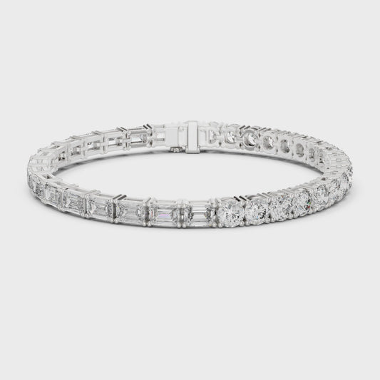 Alternating emerald-cut and round diamond tennis bracelet with polished metal setting