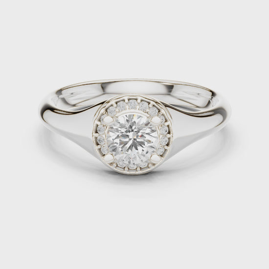 Round lab-grown diamond halo engagement ring in white gold

Elegant women’s engagement ring featuring round center and pavé halo

Classic bridal ring with halo of sparkling accent diamonds