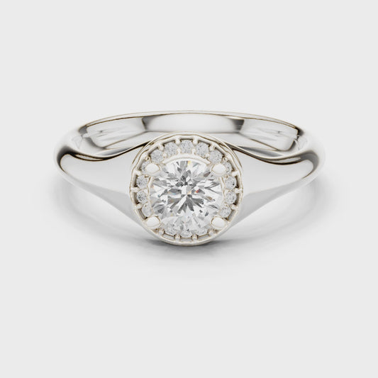 Round lab-grown diamond halo engagement ring in white gold

Elegant women’s engagement ring featuring round center and pavé halo

Classic bridal ring with halo of sparkling accent diamonds