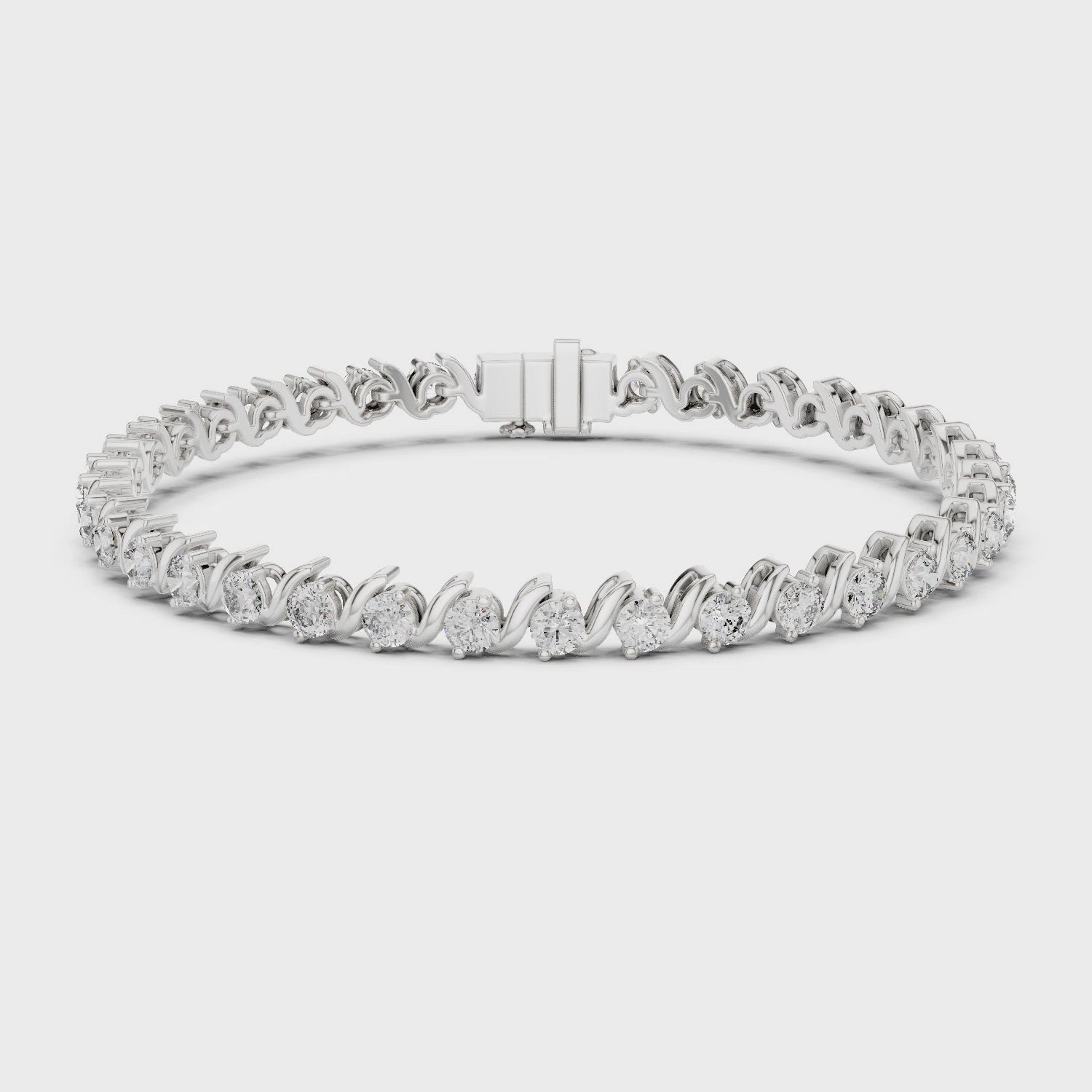 S-link diamond tennis bracelet with round brilliant diamonds and polished metal finish