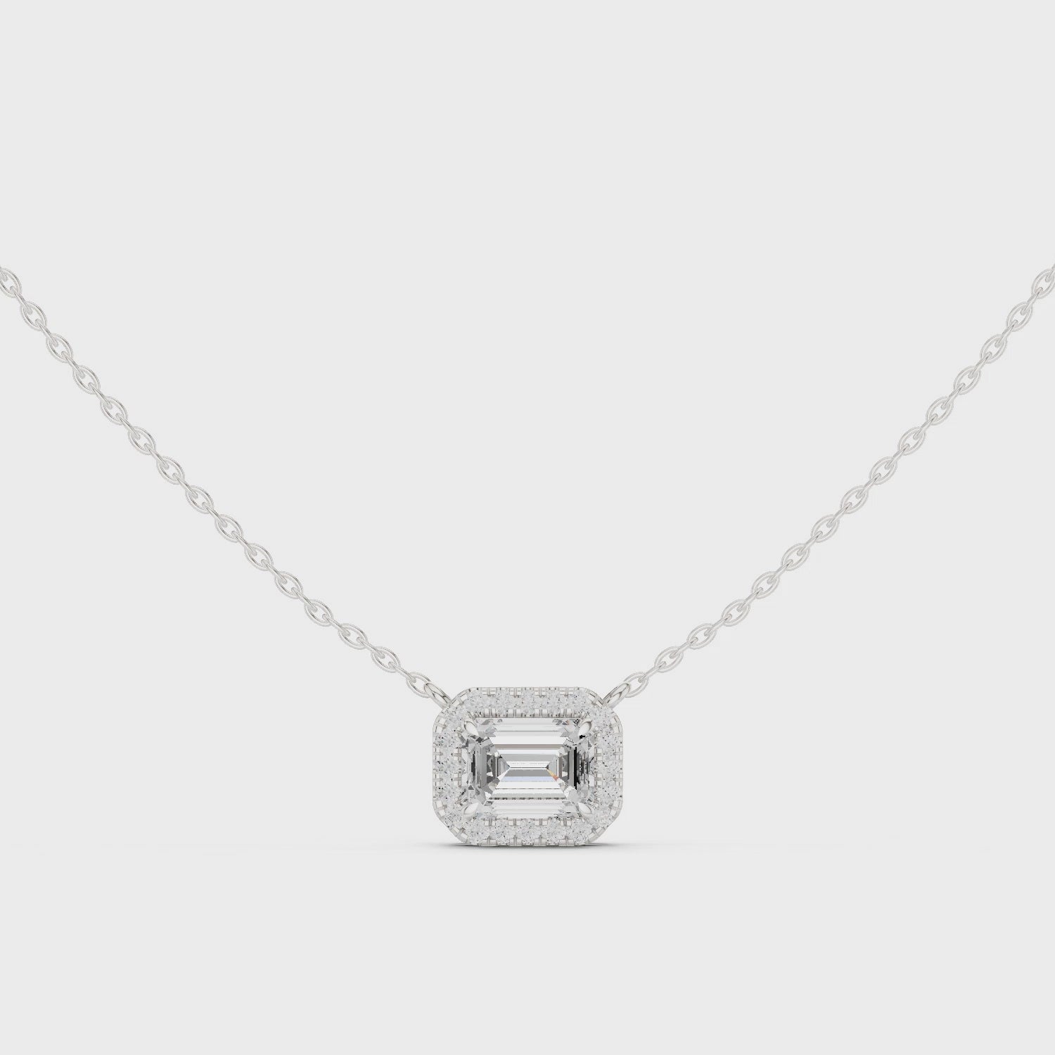 Emerald-cut diamond halo pendant necklace in white gold

Lab-grown emerald cut diamond pendant with halo

Elegant halo diamond necklace for women