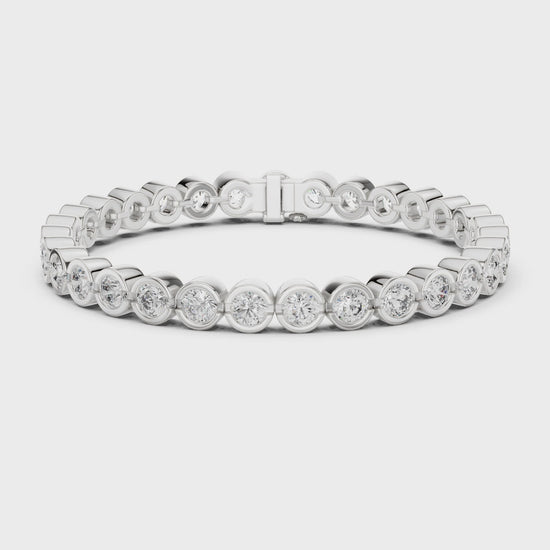 Lab-grown diamond bezel-set tennis bracelet with polished metal finish