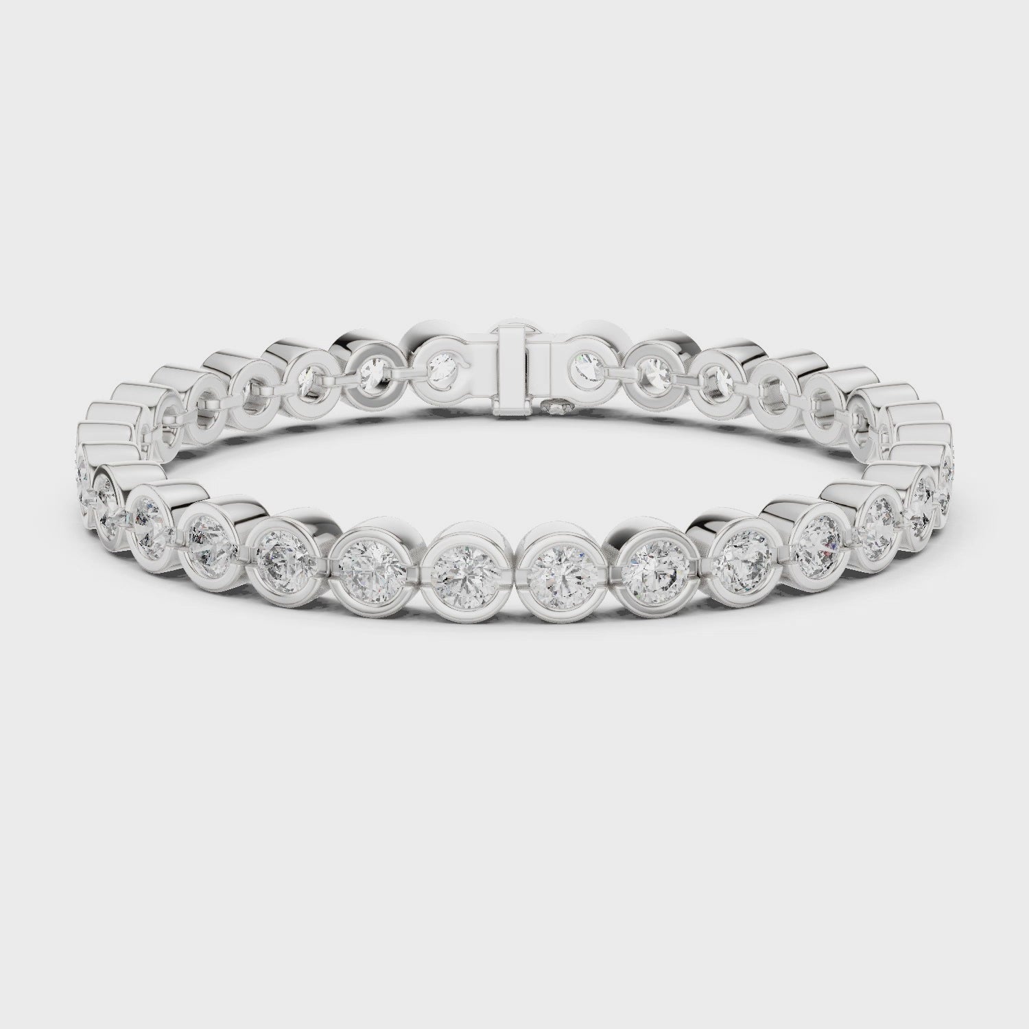 Lab-grown diamond bezel-set tennis bracelet with polished metal finish