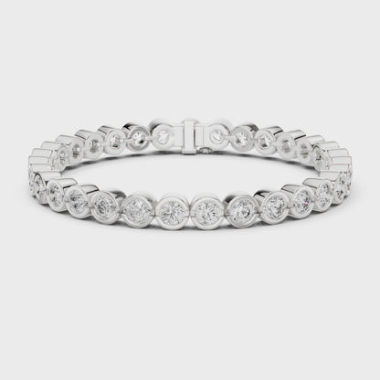 Lab-grown diamond bezel-set tennis bracelet with polished metal finish