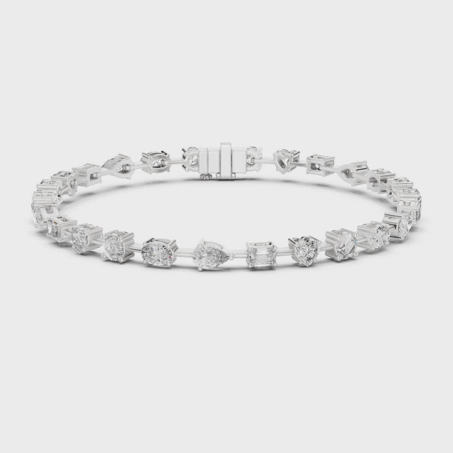 Mixed-cut diamond bracelet featuring multiple diamond shapes in a polished metal setting