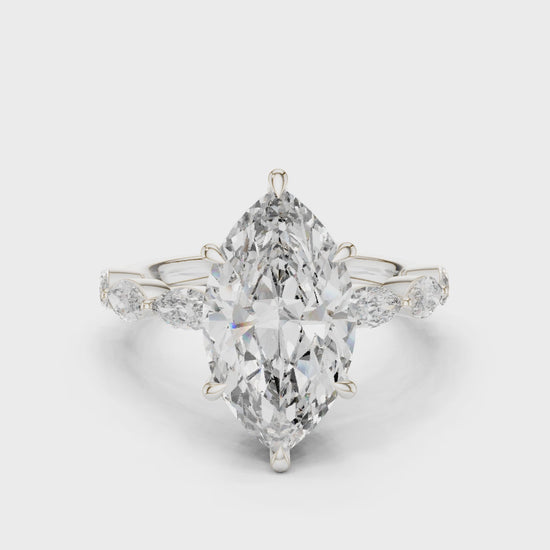Marquise Dawn engagement ring with marquise-cut center diamond and round & marquise side stones

Lab-grown marquise diamond center with sparkling side stones

Elegant bridal engagement ring featuring marquise center and mixed-cut band