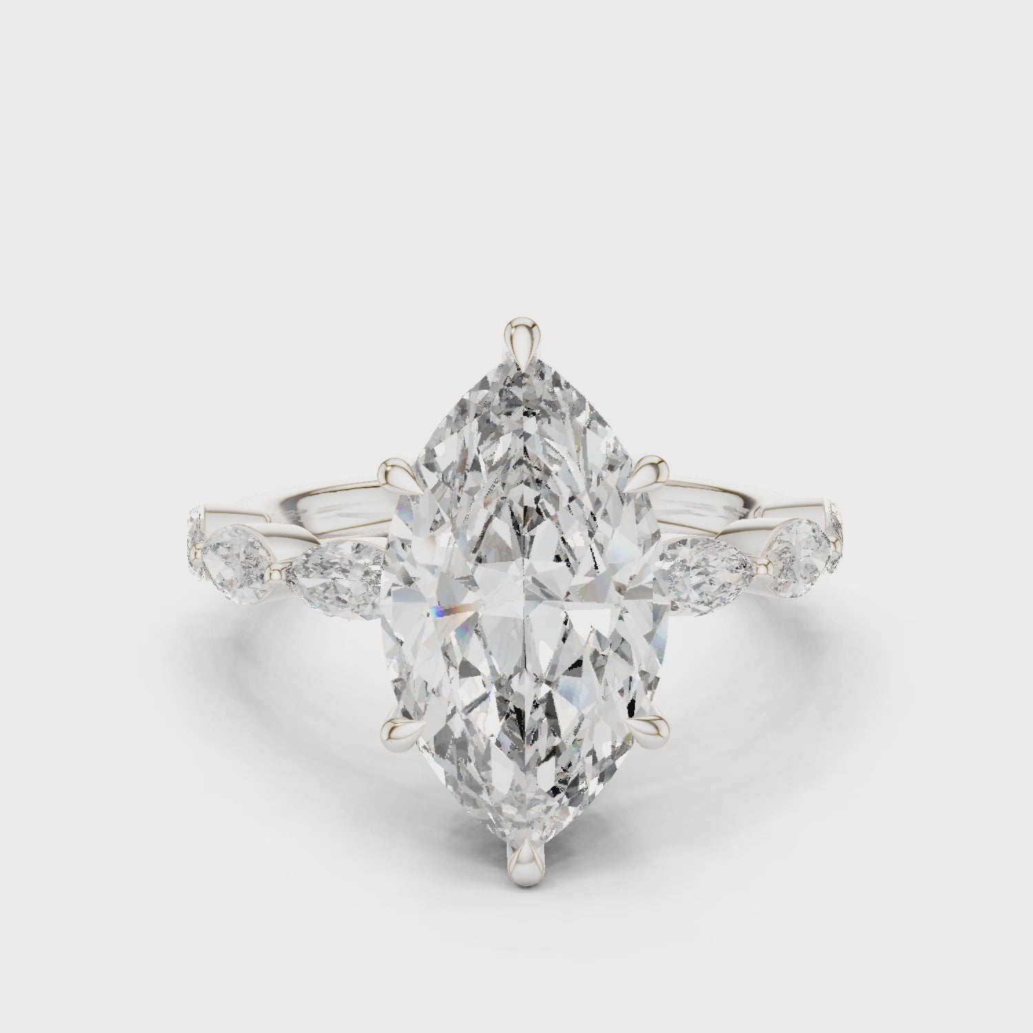 Marquise Dawn engagement ring with marquise-cut center diamond and round & marquise side stones

Lab-grown marquise diamond center with sparkling side stones

Elegant bridal engagement ring featuring marquise center and mixed-cut band