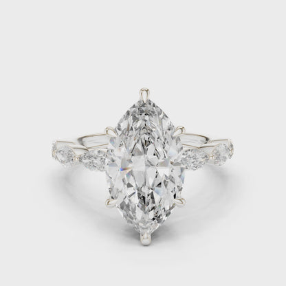 Marquise Dawn engagement ring with marquise-cut center diamond and round & marquise side stones

Lab-grown marquise diamond center with sparkling side stones

Elegant bridal engagement ring featuring marquise center and mixed-cut band