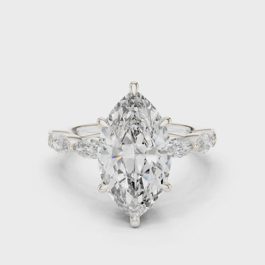 Marquise Dawn engagement ring with marquise-cut center diamond and round & marquise side stones

Lab-grown marquise diamond center with sparkling side stones

Elegant bridal engagement ring featuring marquise center and mixed-cut band