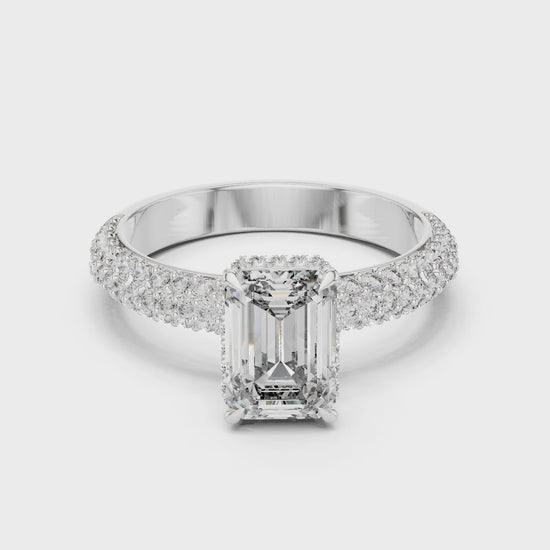 Emerald-cut lab-grown diamond engagement ring with hidden halo

Pavé-set shank engagement ring in white gold

Modern and elegant emerald-cut bridal ring
