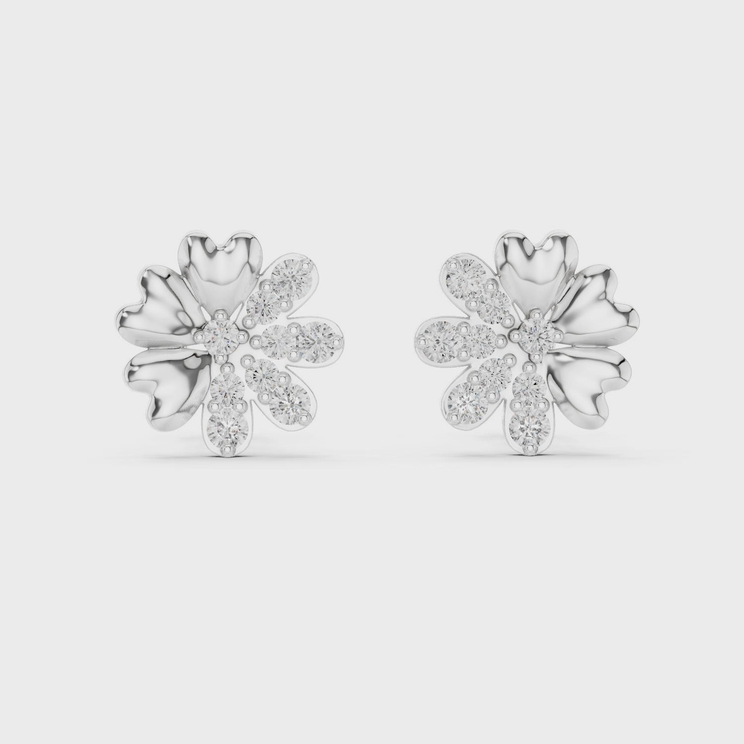 Flower-shaped heart diamond stud earrings featuring a floral cluster design