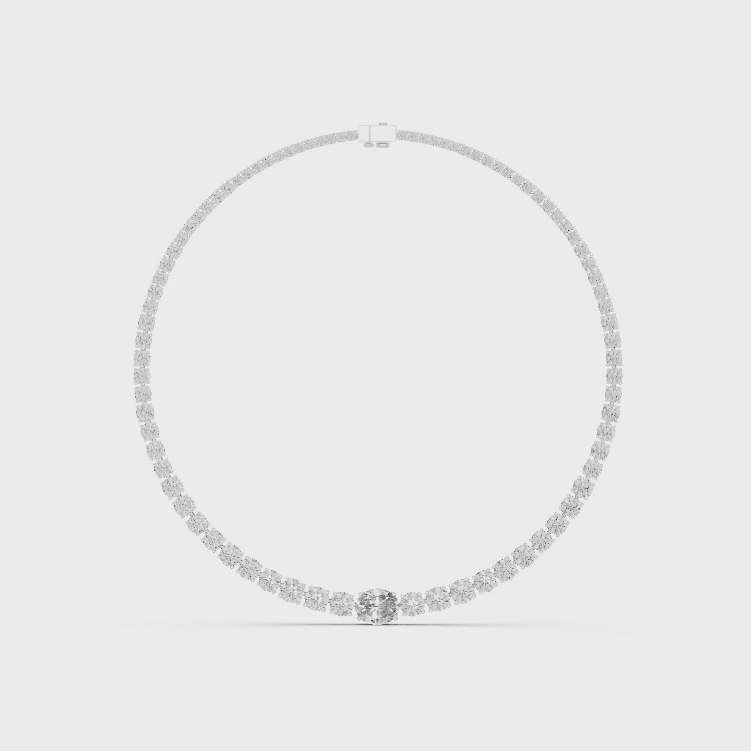 Matisha graduated diamond rivière necklace featuring round diamonds increasing in size toward the center