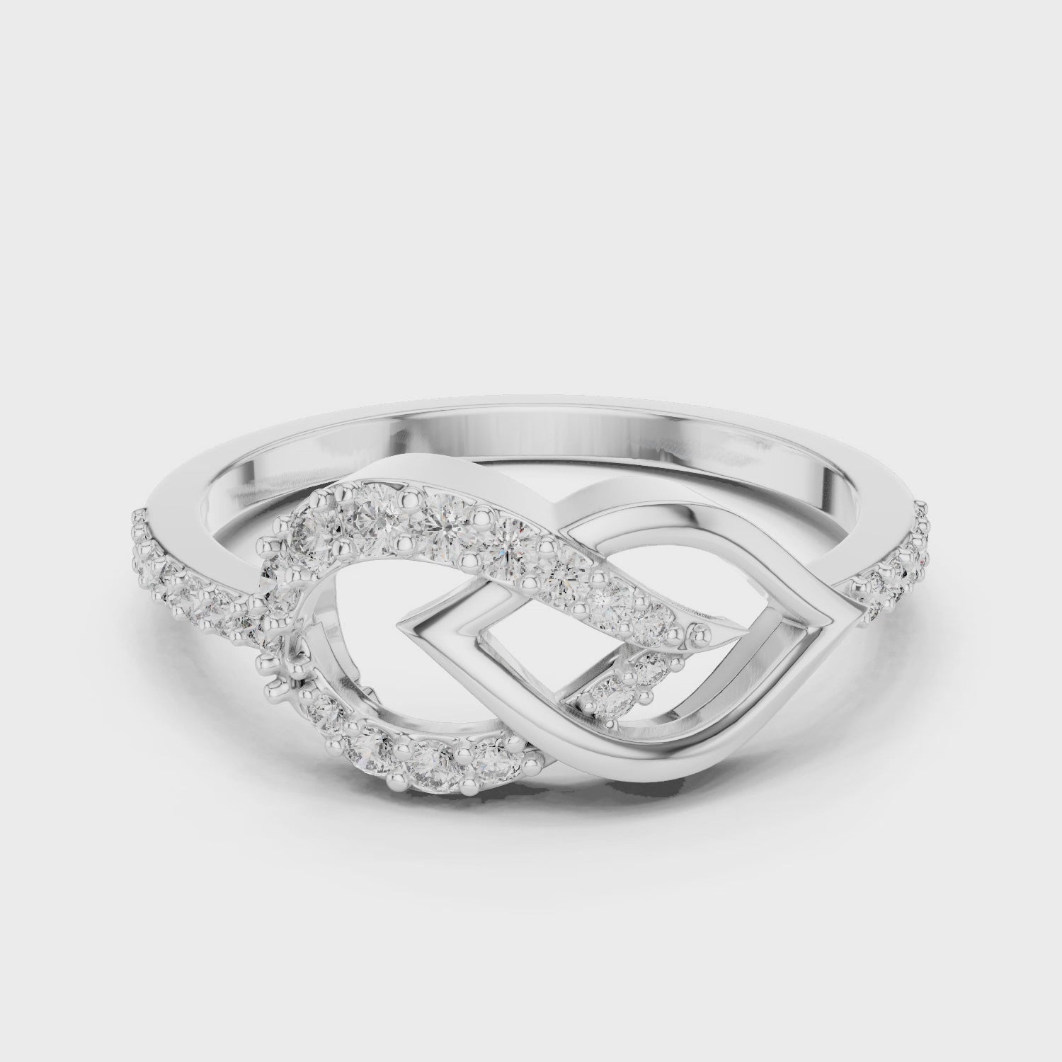 Pear border diamond ring featuring a pear-shaped center diamond surrounded by a halo