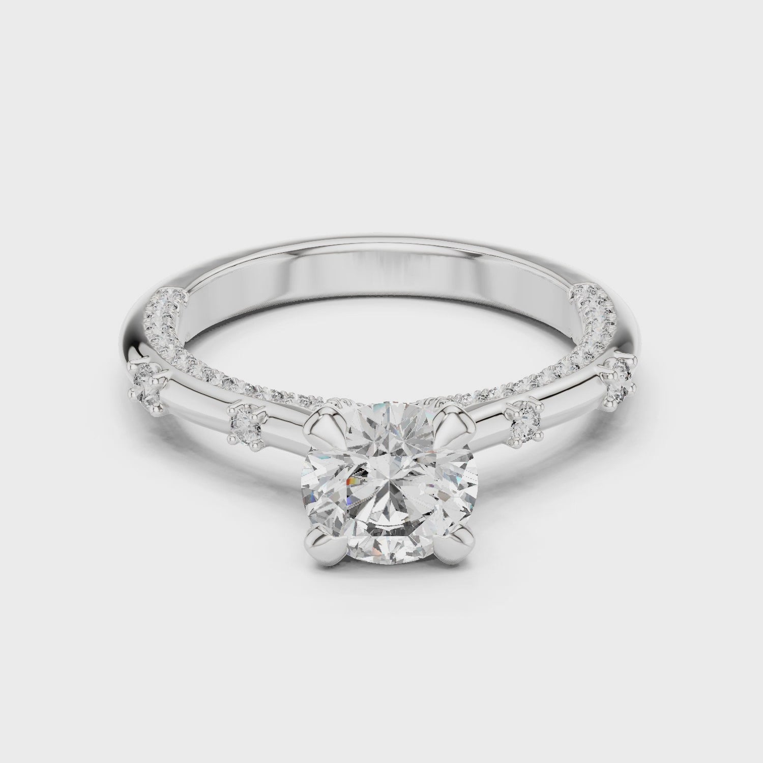 Diamond solitaire engagement ring setting in white gold

Classic solitaire ring setting for center diamond

Minimalist engagement ring setting with high-polish finish
