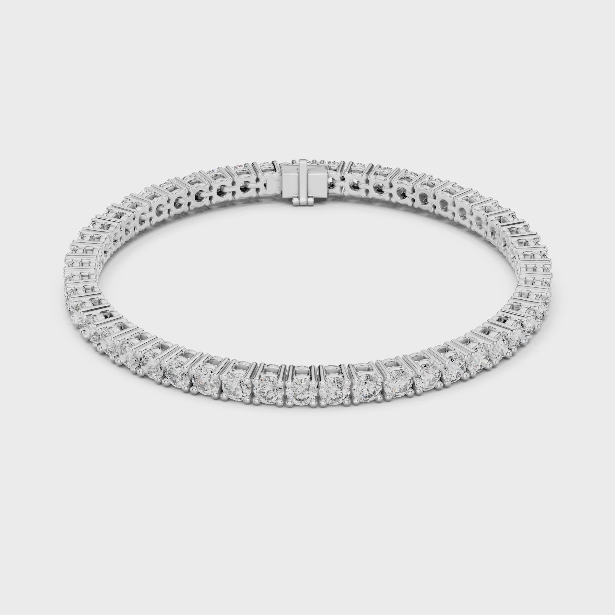 Round-cut diamond tennis bracelet featuring continuous brilliant diamonds
