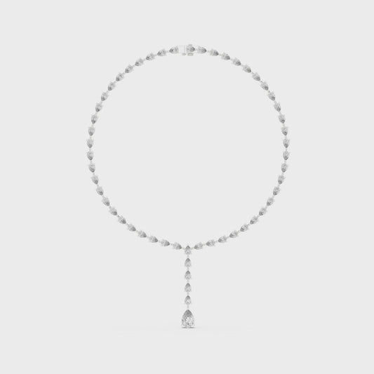 Pear diamond tennis necklace featuring round diamonds with pear-shaped drop pendant in polished metal