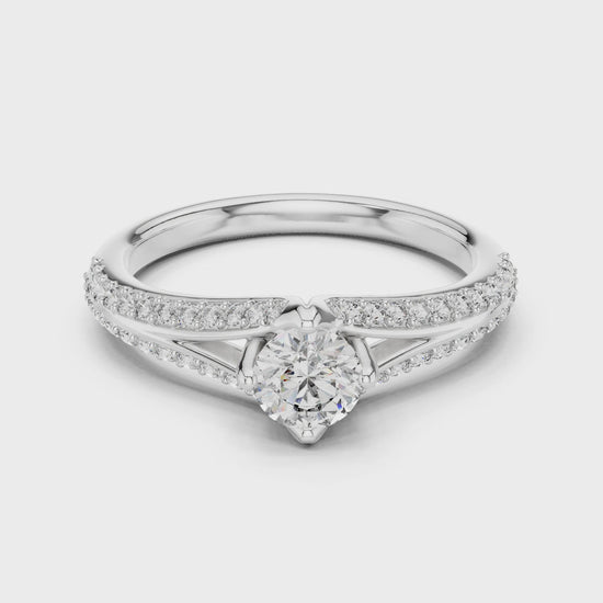 Split-shank solitaire ring with round lab-grown diamond

Elegant round center diamond engagement ring

Close-up of split-shank diamond ring in white gold
