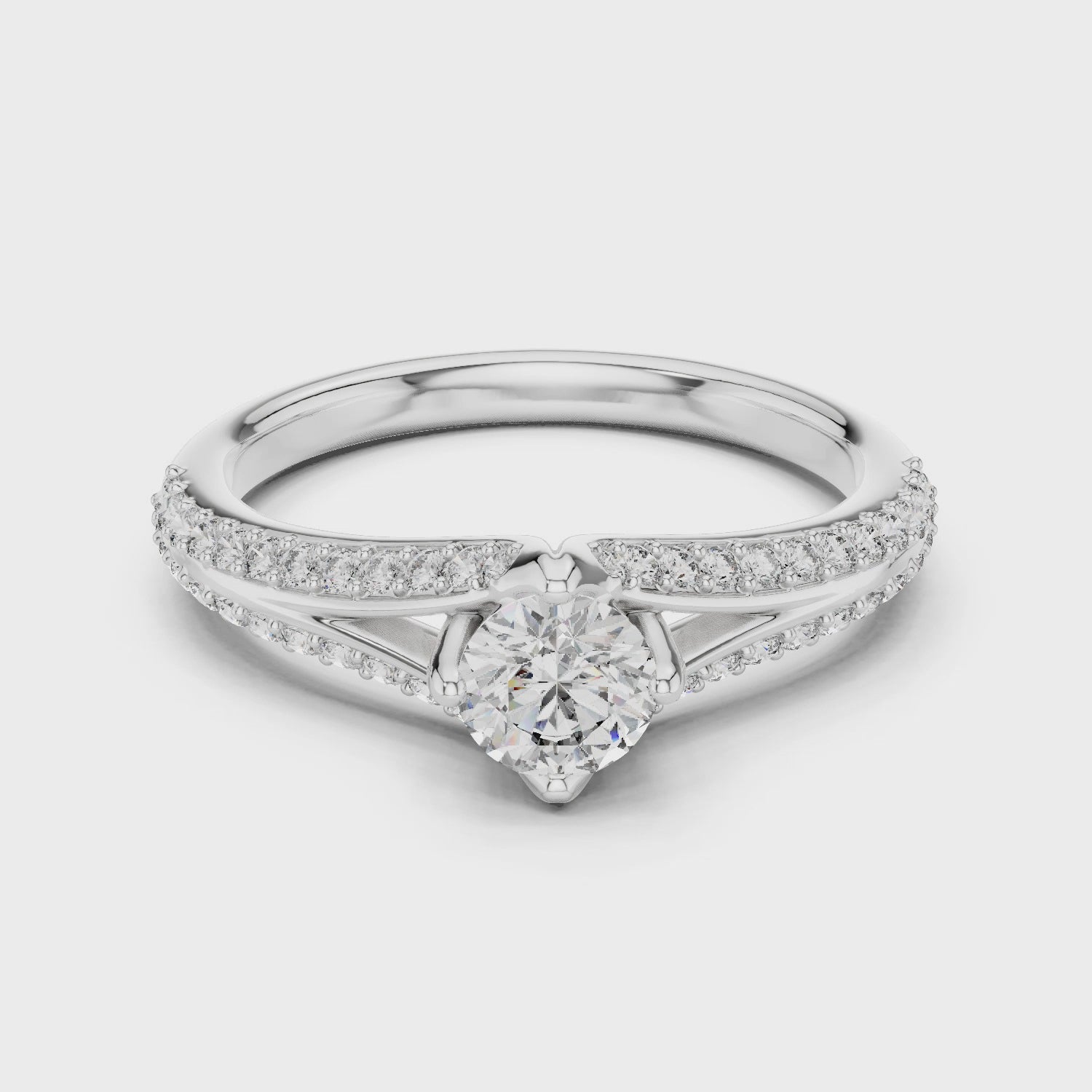 Split-shank solitaire ring with round lab-grown diamond

Elegant round center diamond engagement ring

Close-up of split-shank diamond ring in white gold