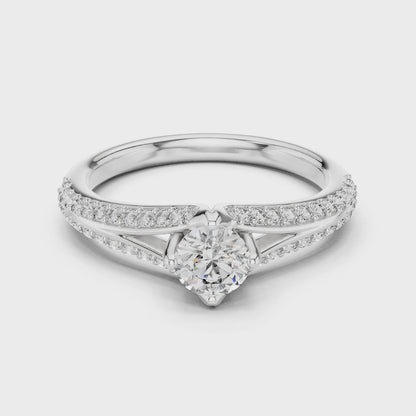 Split-shank solitaire ring with round lab-grown diamond

Elegant round center diamond engagement ring

Close-up of split-shank diamond ring in white gold