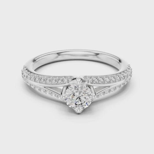 Split-shank solitaire ring with round lab-grown diamond

Elegant round center diamond engagement ring

Close-up of split-shank diamond ring in white gold