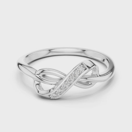 Silver pavé infinity ring with sparkling diamonds and high-polish finish
