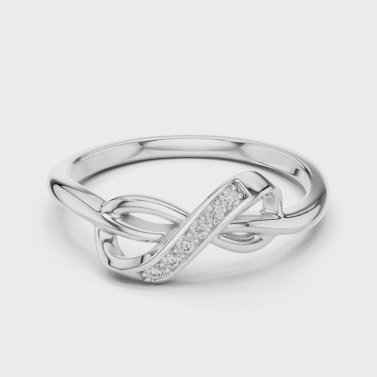 Silver pavé infinity ring with sparkling diamonds and high-polish finish