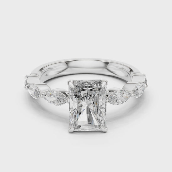 Radiant-cut moissanite ring with marquise side stones

Hidden halo moissanite engagement ring in white gold

Luxury radiant moissanite ring for women