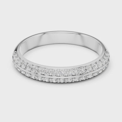 Dainty flower-shaped diamond ring featuring a petite floral motif with sparkling diamonds