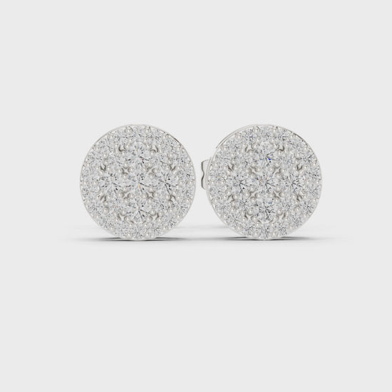 Pair of round cluster diamond stud earrings in white gold

Elegant women’s stud earrings featuring circular diamond clusters

Timeless fine jewelry earrings with sparkling cluster design