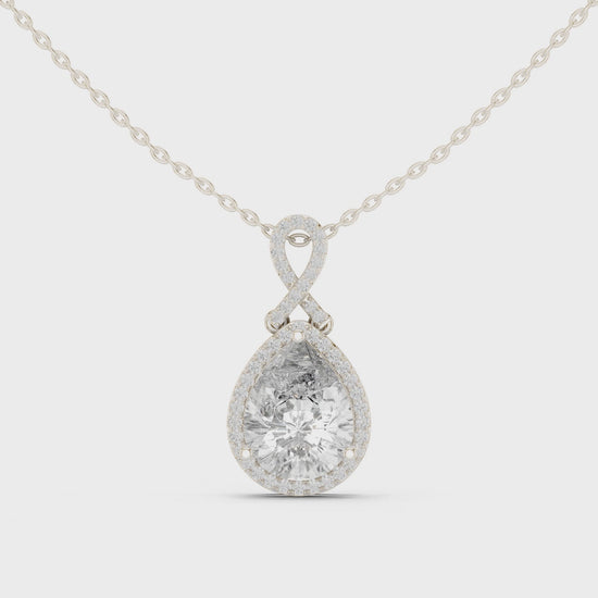 Pear-shaped lab-grown diamond halo pendant necklace

Pear diamond halo pendant in white gold

Teardrop diamond halo pendant close-up