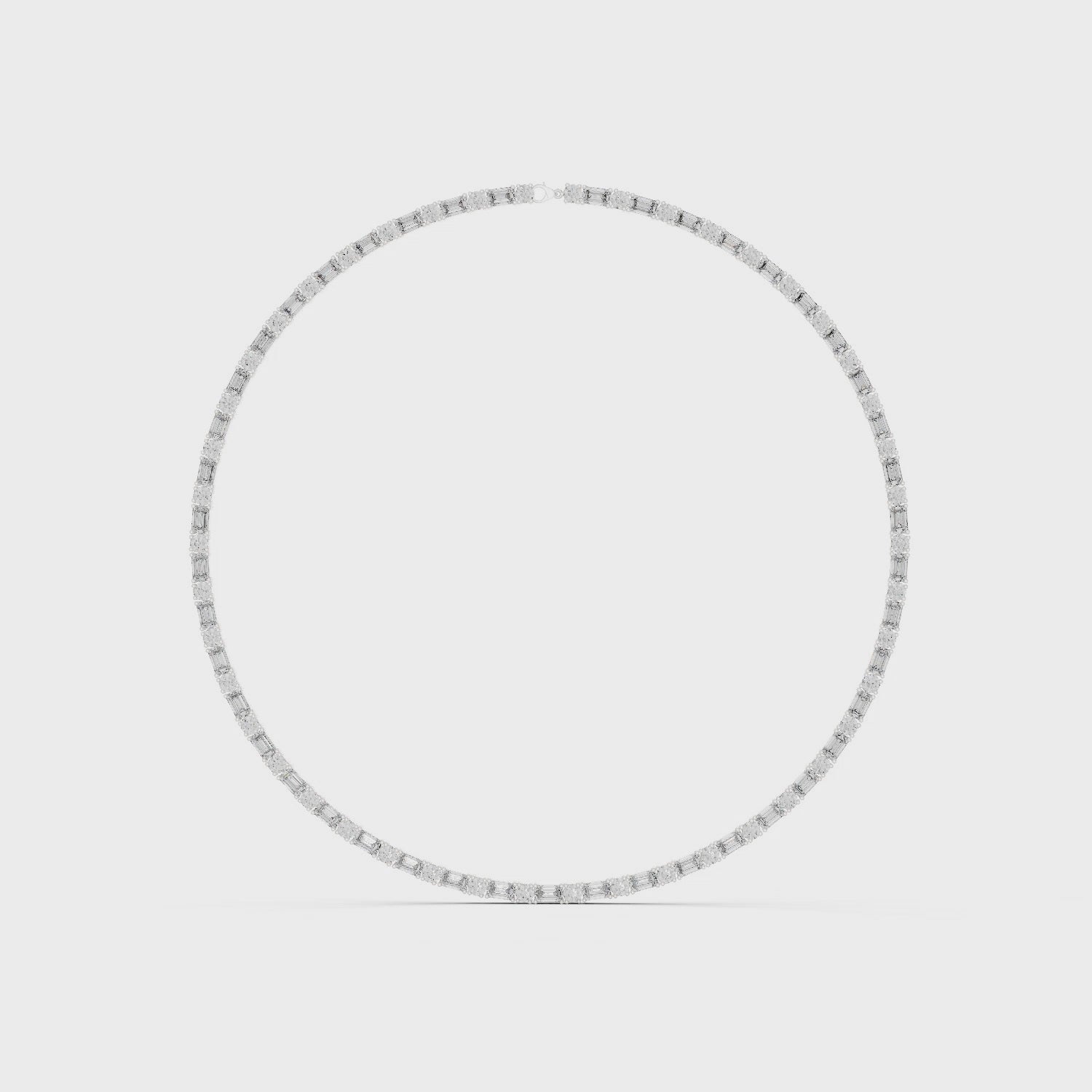 Emerald and round diamond tennis necklace featuring alternating cuts in a high-polish setting