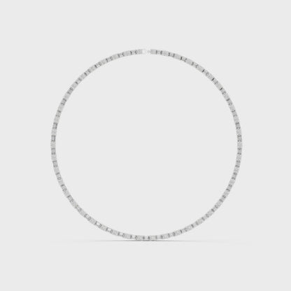 Emerald and round diamond tennis necklace featuring alternating cuts in a high-polish setting