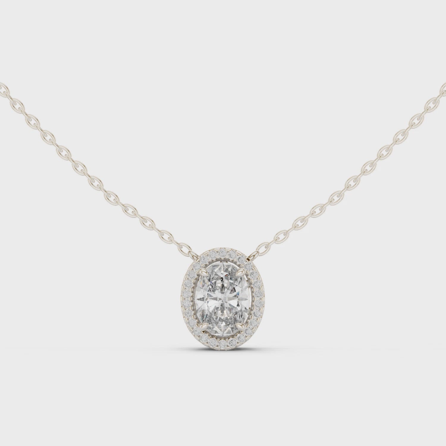 Oval diamond halo pendant necklace in white gold

Lab-grown oval diamond halo pendant close-up

Oval cut diamond necklace with halo setting