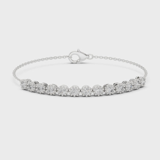 Classic diamond tennis bracelet with individually set round diamonds on a delicate chain