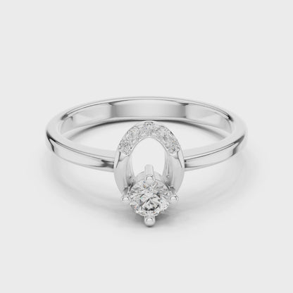 Horseshoe engagement ring featuring a brilliant diamond symbolizing luck and love