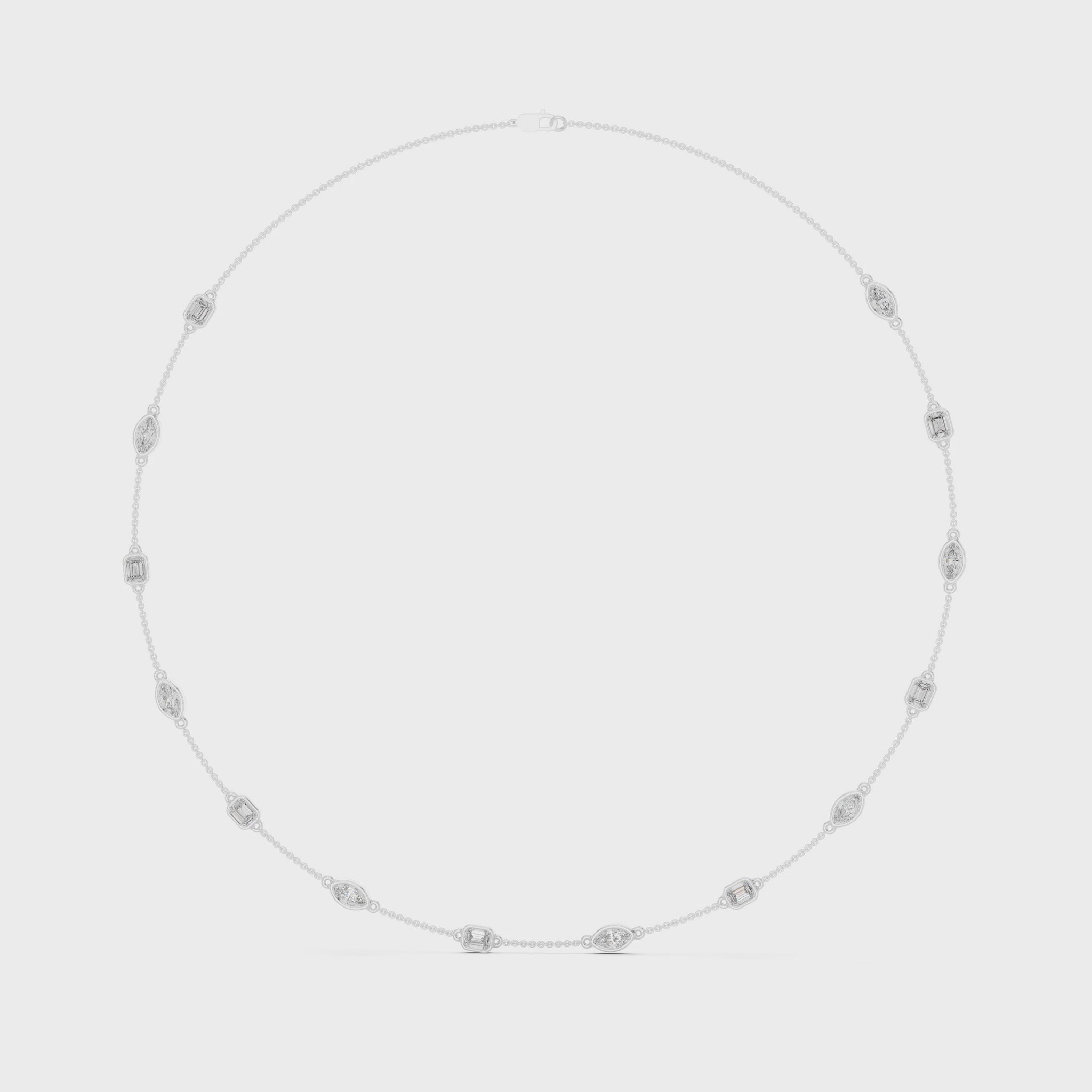 Matisha marquise and emerald lab-grown diamond station necklace on a polished chain