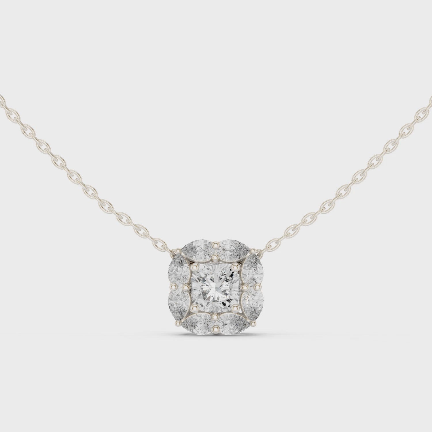 Princess-cut diamond halo pendant necklace

Lab-grown diamond pendant with pear and marquise halo

Floral diamond pendant in white gold