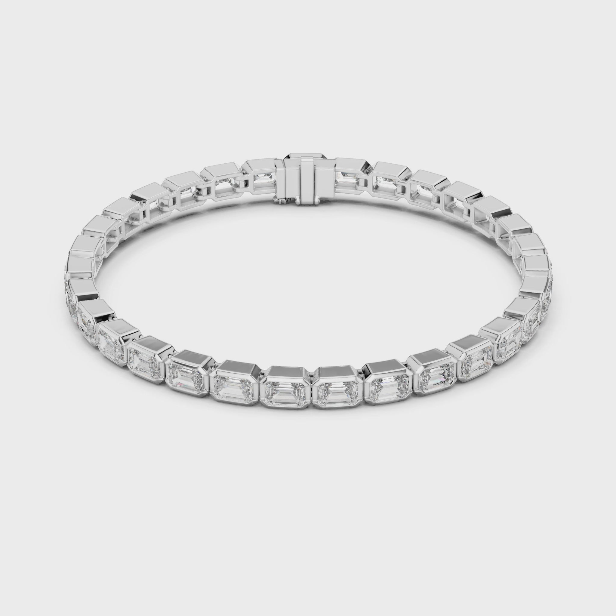 Emerald-cut diamond tennis bracelet with bezel setting in a modern luxury design