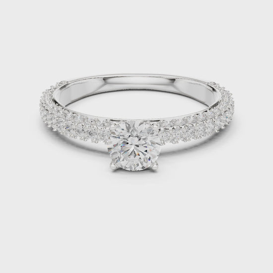 Solitaire engagement ring with pavé diamond band

Lab-grown diamond solitaire engagement ring

Elegant engagement ring with sparkling pavé accents