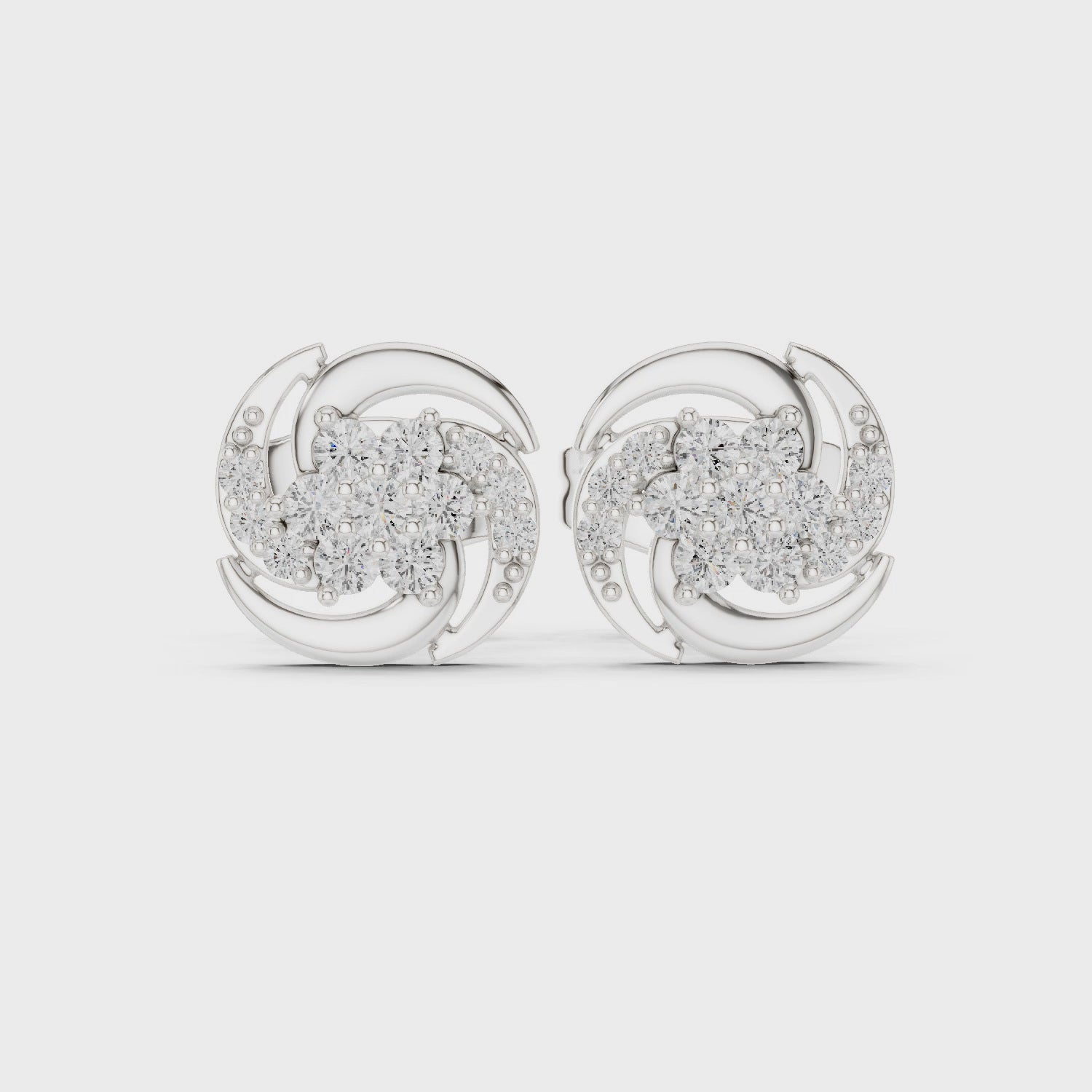 Pair of Lustrous Mirage swirl diamond stud earrings in white gold

Elegant women’s stud earrings featuring sparkling diamonds in a swirl design

Timeless fine jewelry earrings with swirl-inspired setting